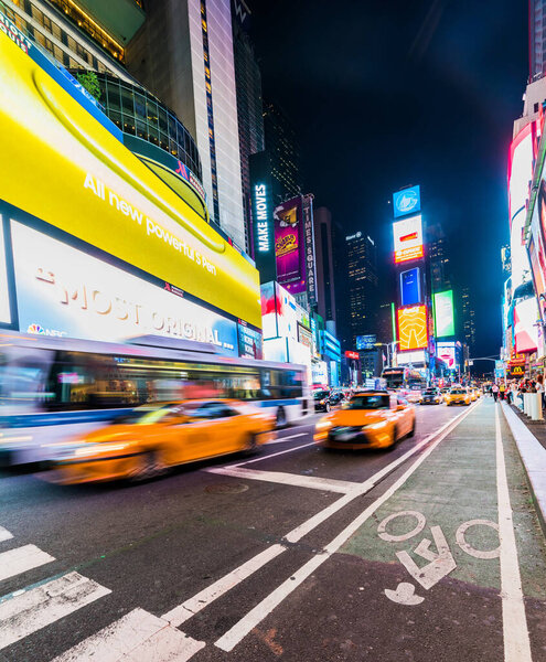 NEW YORK, USA - September 26, 2018: Times Square at night. World's most visited tourist attraction Times Square is famous touristic location of New York. Manhattan, New York City, USA.