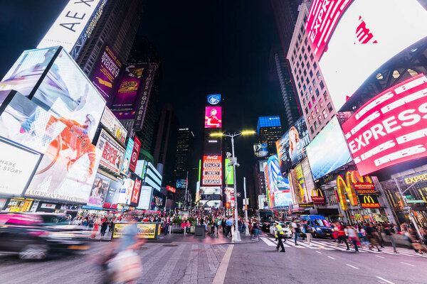 NEW YORK, USA - September 26, 2018: Times Square at evening. World's most visited tourist attraction Times Square is famous touristic location of New York. Manhattan, New York City, USA.