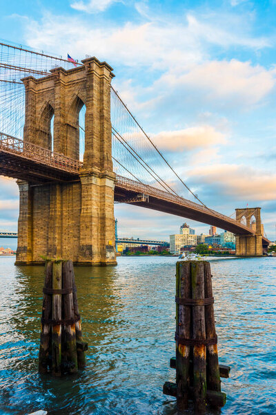 Brooklyn Bridge with blue sky. New York City, USA. Brooklyn Bridge is linking Lower Manhattan to Brooklyn.