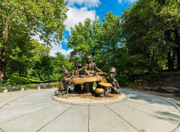 NEW YORK, USA - September 26, 2018: Alice in Wonderland Statue in CENTRAL PARK. Central Park is an urban park in Manhattan. Popular destination for tourists. New York City, USA.