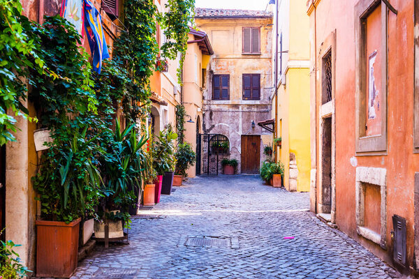 Beautiful old street in Trastevere. Rome, Italy. Trastevere is one of Rome's beautiful old neighbourhoods. Trastevere is a romantic district of Rome, along the Tiber in Rome.