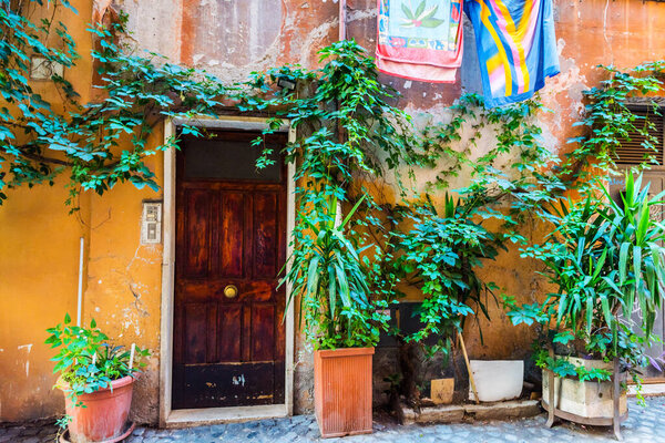 Beautiful old street in Trastevere. Rome, Italy. Trastevere is one of Rome's beautiful old neighbourhoods. Trastevere is a romantic district of Rome, along the Tiber in Rome.