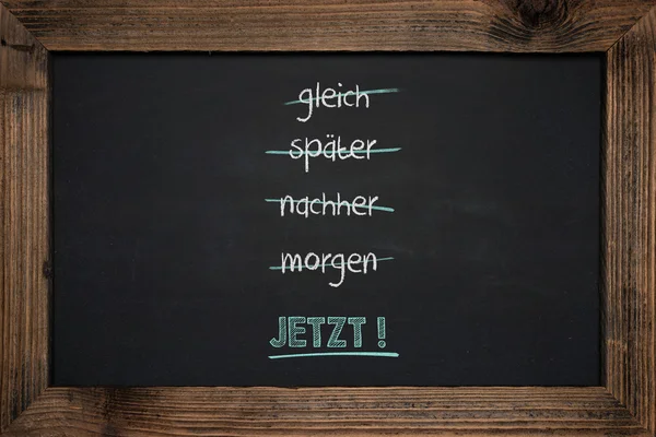 Sukces w biznesie tablica pisma w języku niemieckim — Zdjęcie stockowe