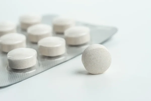 Tabletta-gyógyszer, az emberi egészségre — Stock Fotó