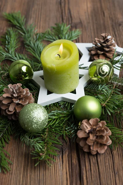 Christmas table decoration for Advent with burning candle — Stock Photo, Image