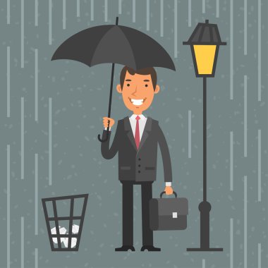 Yağmurda şemsiye ile ayakta işadamı