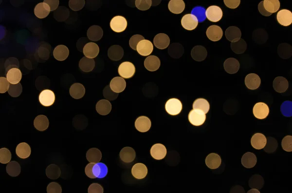 Siyah Arkaplanda Çok Renkli Işıkların Bulanık Noktalarını Özetle Stok Resim