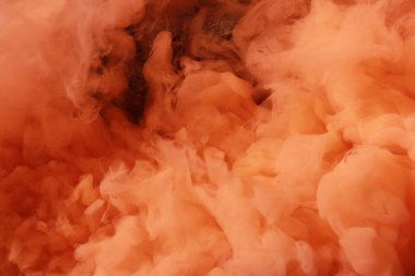 Arkaplanda kalın turuncu dumanın arka planı