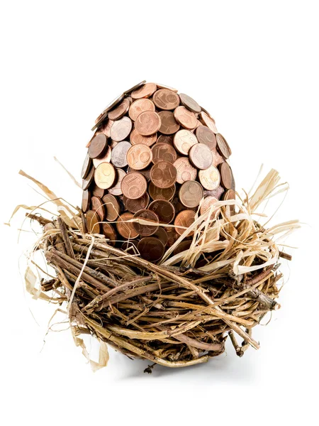 One eurocent egg in bird's nest — Stock Photo, Image