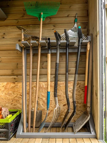 Rack with garden tools — Stock Photo, Image