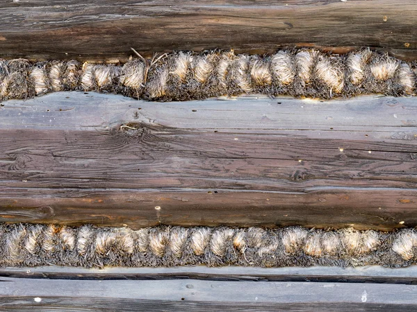 Wooden cabin wall sealing — Stock Photo, Image