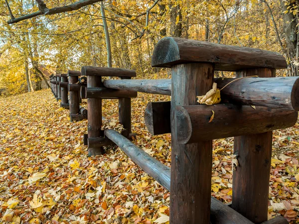 Wooden rustic log fence — Stock Photo, Image