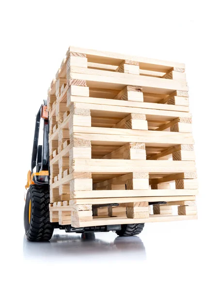 Forklift truck with pallets Stock Picture