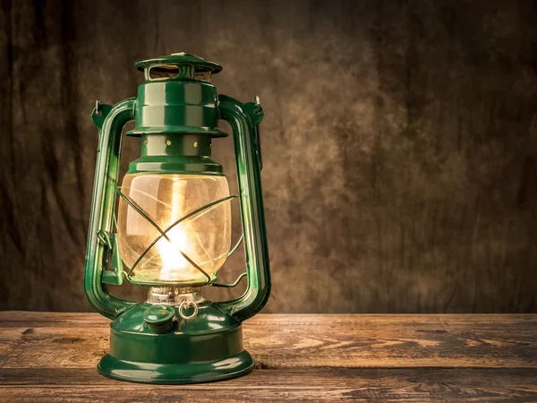 Lit vintage oil lamp — Stock Photo, Image