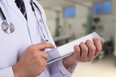 Doctor holding tablet