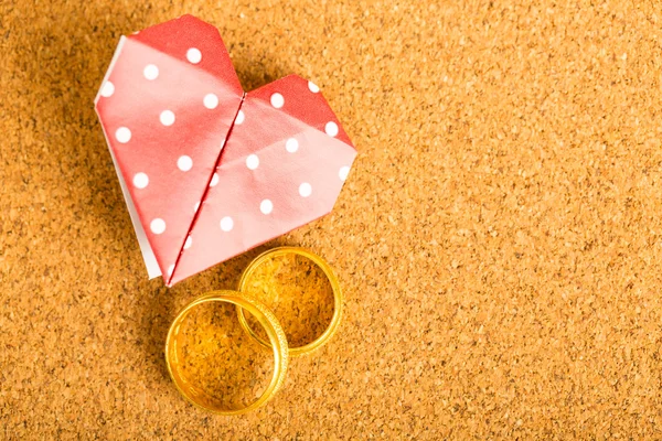 Red paper heart and engagement ring — Stock Photo, Image