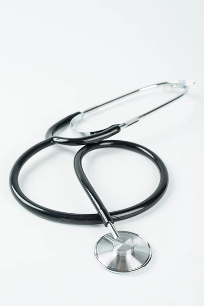 Black stethoscope isolated — Stock Photo, Image