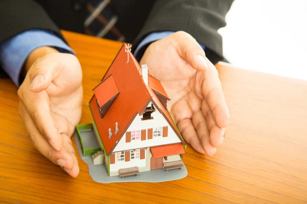 Businessman show  your good property — Stock Photo, Image