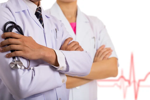 Médico sosteniendo estetoscopio con uniforme médico en el hospital —  Fotos de Stock