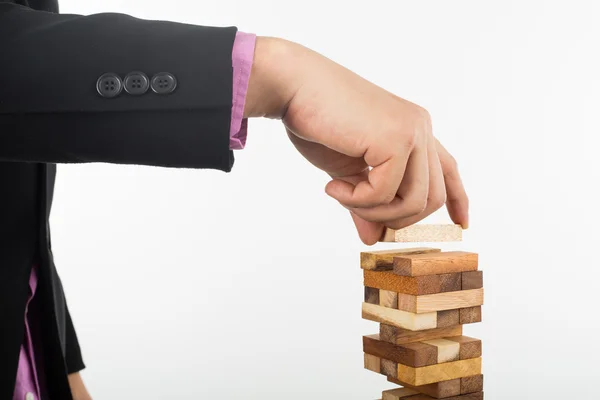 Risken affärsidé med trä jenga spel — Stockfoto