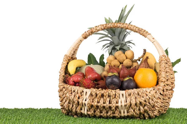 Tropical fruits inside basket — Stock Photo, Image