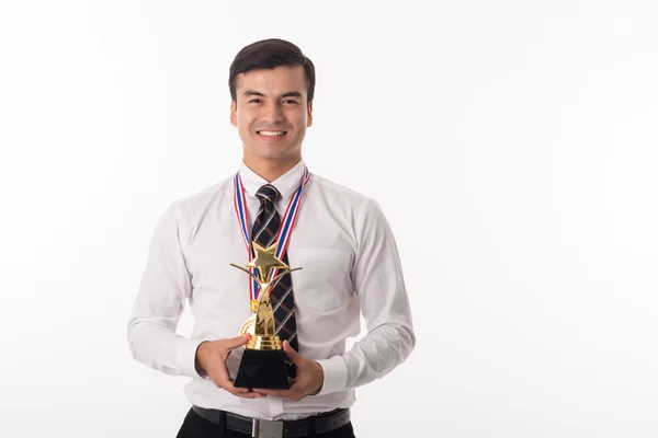 Winner businessman holding golden trophy — Stock Photo, Image