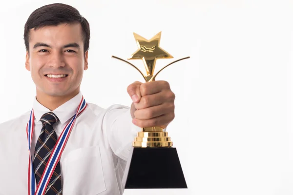 Winner businessman holding golden trophy — Stock Photo, Image