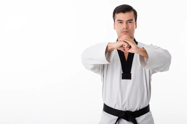 Taekwondo czarny pas na białym tle — Zdjęcie stockowe