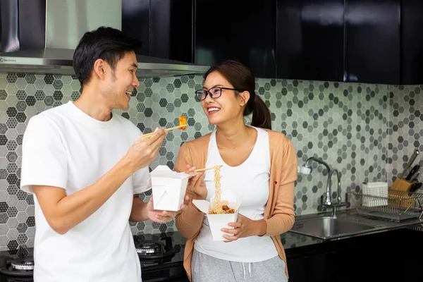 Asian Couple Eating Instant Noodles Together Kitchen Enjoy Meal Healthy Royalty Free Stock Images