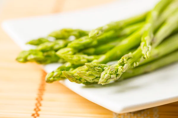 Bunch of fresh asparagus tie — Stock Photo, Image