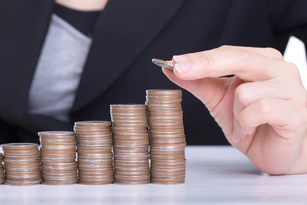 Business women put coin stack money — Stock Photo, Image