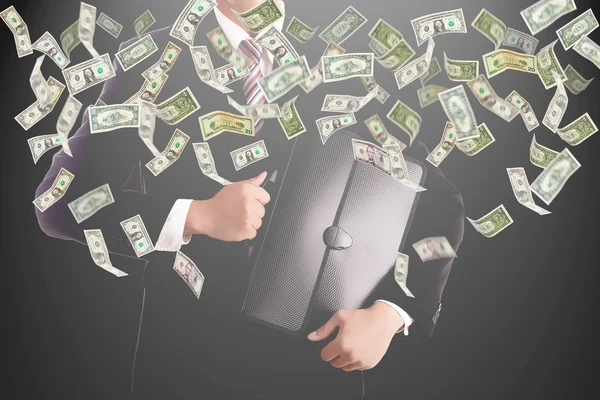 Businessman catching money — Stock Photo, Image