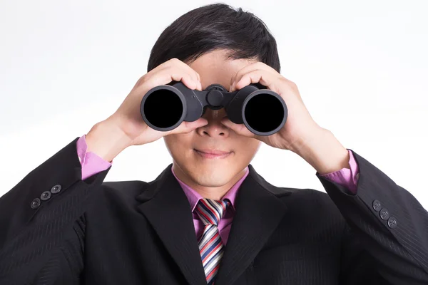 Businessman watch with binoculars — Stock Photo, Image