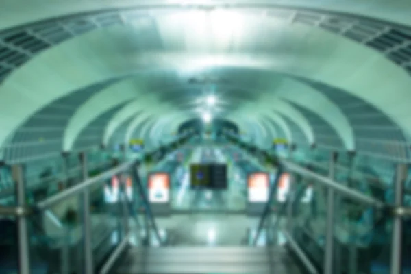 Blurred image inside airport — Stock Photo, Image