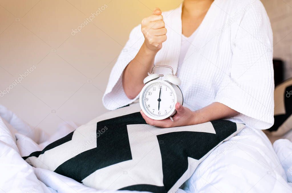 Women hates getting stressed waking up late 6 o'clock,Alarm clock,Weekend morning