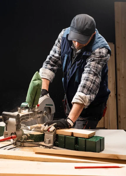 Closeup Young Man Sawing Lumber Sliding Compound Miter Saw Indoors — Stok fotoğraf