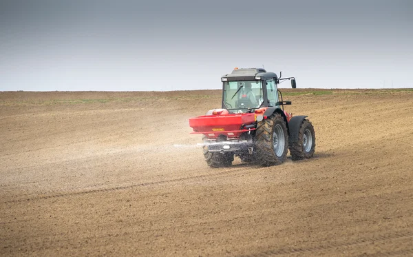 Tractor and fertilizer — Stock Photo, Image