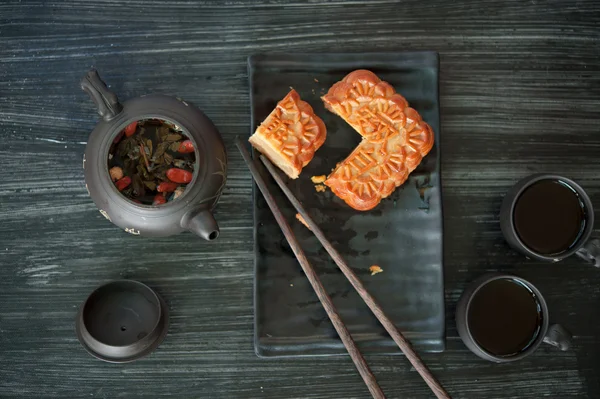 Dark tea-set on dark table — Stock Photo, Image