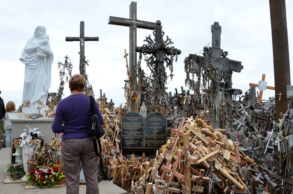 Cca 12 km north of the city of SIAULIAI / LITHUANIA - July 24, 2013: Close view of the Hill of Crosses, a place of worship for Christians — Stock Photo, Image