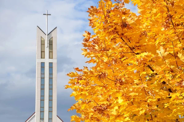 Modern christian church in autumn — Stock Photo, Image