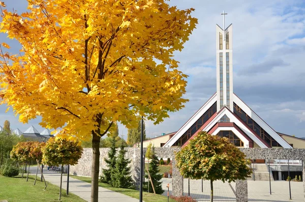 Modern christian church in autumn — Stock Photo, Image