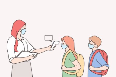 Okulda salgın konsepti sırasında sıcaklık ölçümü