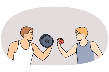 Spor müsabakası erkekler arasında spor salonunda ağırlık kaldırmak ya da spor salonunda spor hocalığı yapmak. Profesyonel fitness eğitmeni öğrenciyi spor ya da vücut geliştirmeye teşvik ediyor