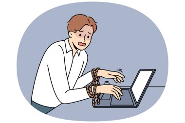 İşadamı işten dolayı köleliğe düşmüş ve elleri bağlı bir şekilde dizüstü bilgisayarın yanında durarak acı çekiyor. Meslek köleliği kavramı, sendika eksikliği nedeniyle fazla mesai ve mesai yapmaya zorluyor