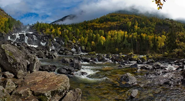 Russia. Mountain Altai. Cascade waterfall \