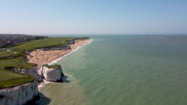 Botany Bay sahilindeki deniz kenarında bir paraglider.
