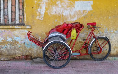 Cyclos human transportation, Saigon, Vietnam. traditional hiring vehicle for city tour in vietnam that let passenger sit in the front of the driver