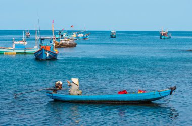 people and boats moving to fishing from the fishery harbor Nam Du Island, Kien Giang, Vietnam