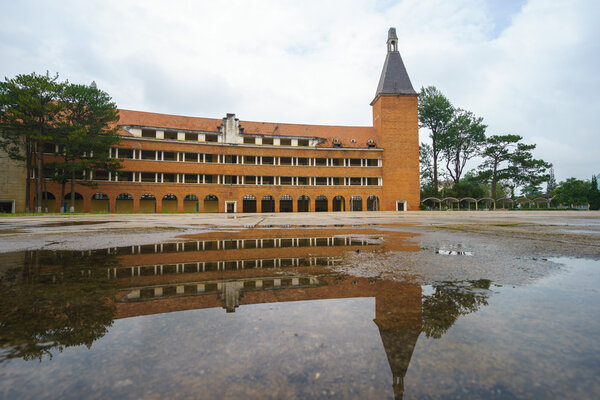 Wall of Teacher College of Dalat after the rain - the architecture that considered as one of the most unique architecture of 1000 's 20th - century at Dalat city, Lam Dong, Vietnam
.