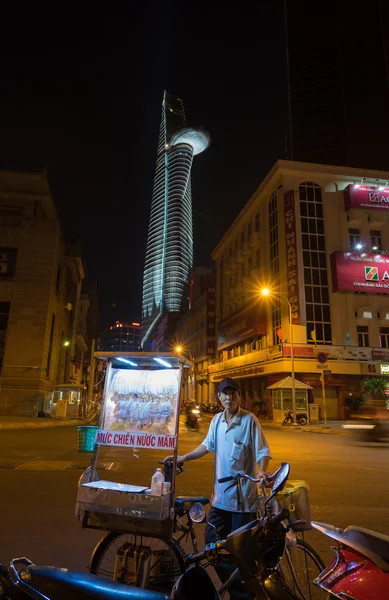 Ho Chi Minh city colorful night with laser lighting on at the Bitexco Financial Tower National celebration 2015 — Stock Photo, Image